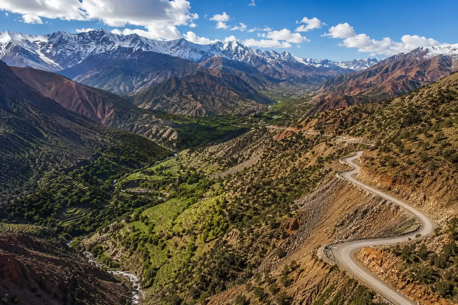 Atlas Mountains aerial view snow-capped peaks Morocco grand tours