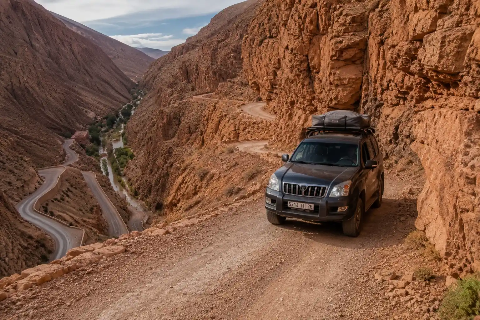 4x4 Land Cruiser on remote mountain piste road upper Dades Gorge
